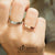 แหวนแฟชั่น สแตนเลสสตีล แท้ ดีไซน์สำหรับ ชายและหญิง สวยเรียบง่าย ฉลุตัวเลขโรมัน ประดับเพชร CZ รุ่น MNC-R729