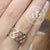 แหวนแฟชั่นสแตนเลส ดีไซน์สวยหวาน ฉลุรูปหัวใจรอบวง รุ่น MNC-R894 - แหวนผู้หญิง แหวนสวยๆ