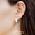 ต่างหูห่วงแฟชั่นสแตนเลส สตีล ประดับเปลือกมุก ดีไซน์เรียบหรู คลาสสิค รุ่น MNC-ER924 - ต่างหูสวยๆ ต่างหูแฟชั่นสวยๆ ต่างหูผู้หญิง